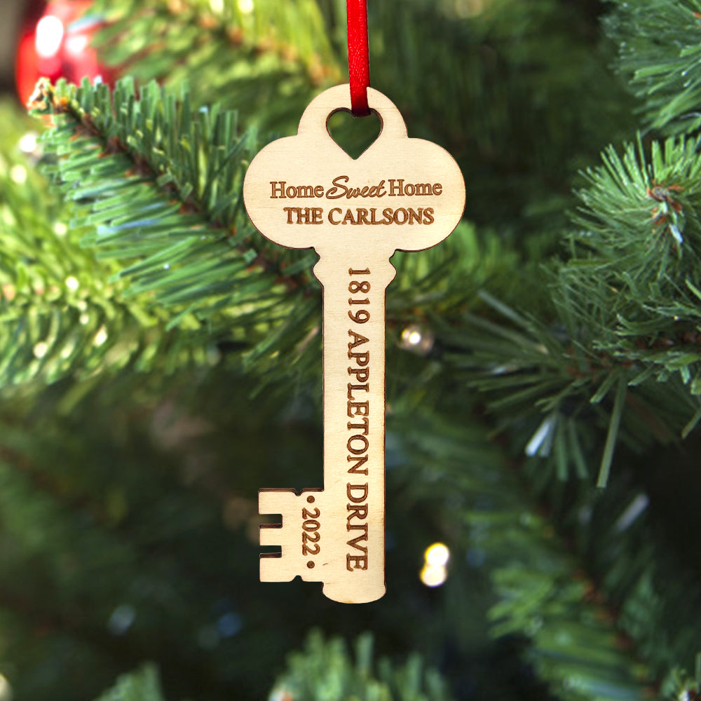 Personalized wooden key Christmas ornament, ideal housewarming gift with festive design, perfect for new home decor.